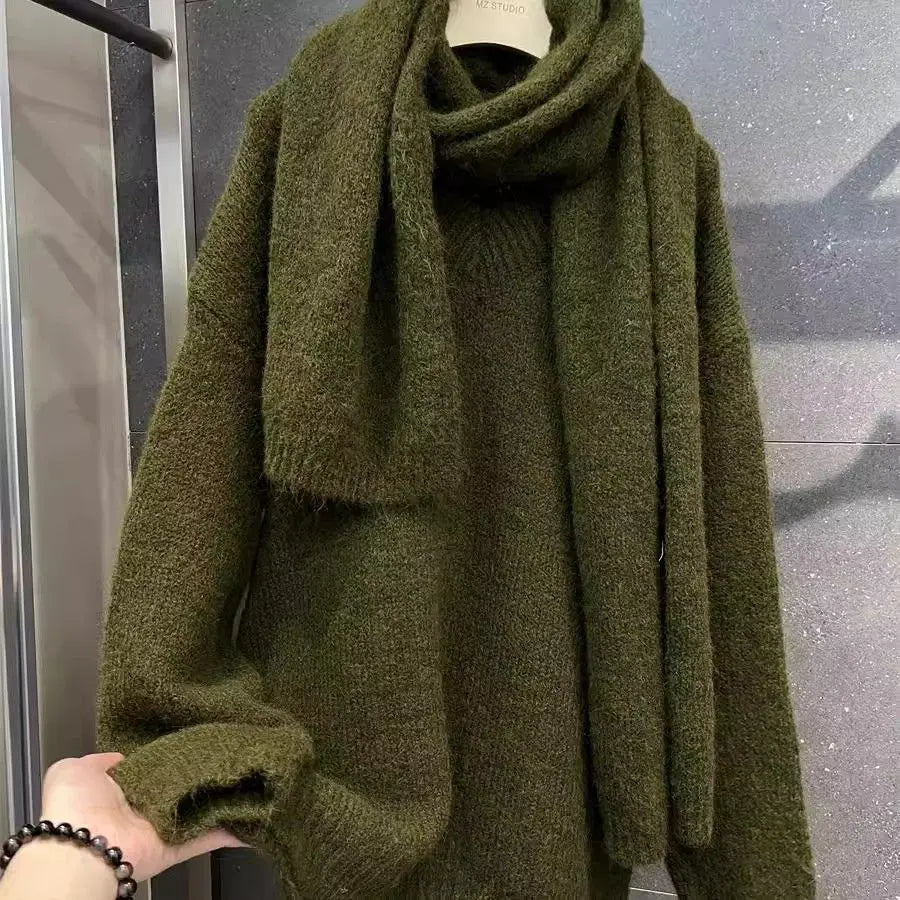 Green knitted sweater with matching scarf