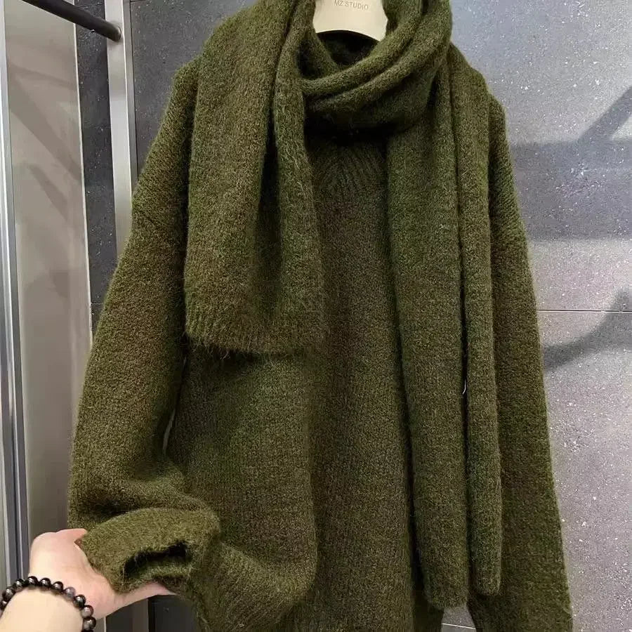 Green knitted sweater with matching scarf
