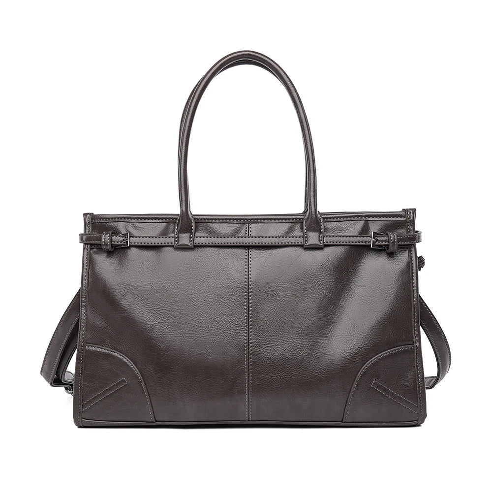 Dark brown leather handbag with a strap