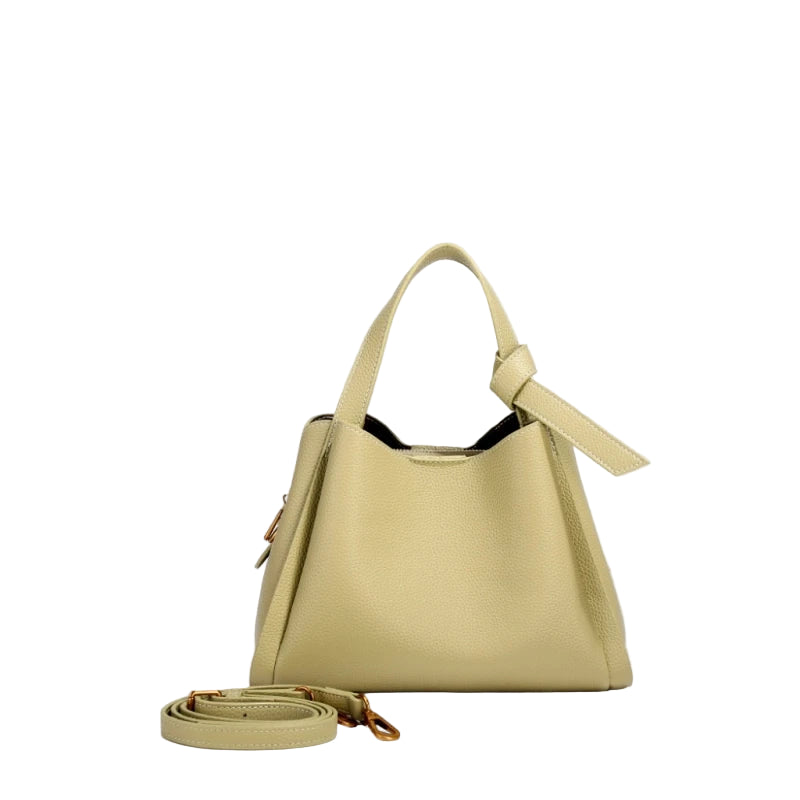 Beige handbag with a strap on a white background