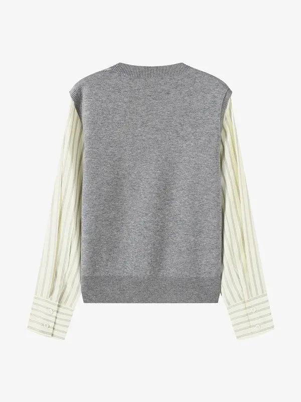 Gray sweater with white ribbed sleeves on a white background