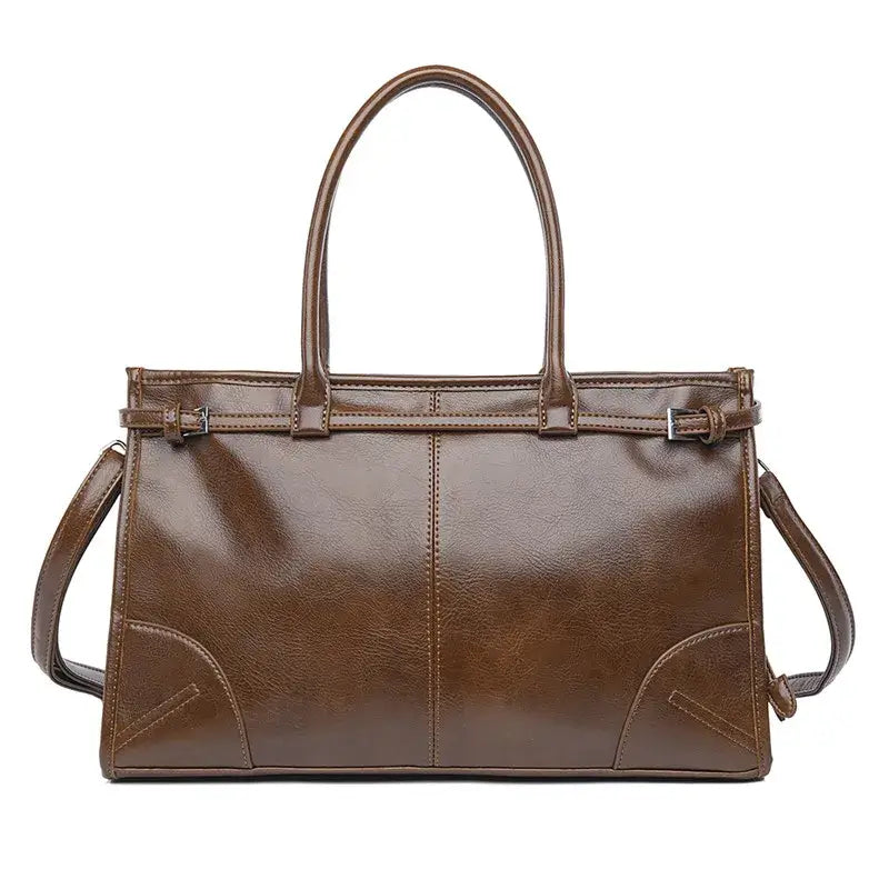 timeless functional bags in rich brown leather with elegant design and dual handles