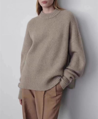 Close-up of heavyweight natural knit texture and ribbed collar on pure cashmere sweater.