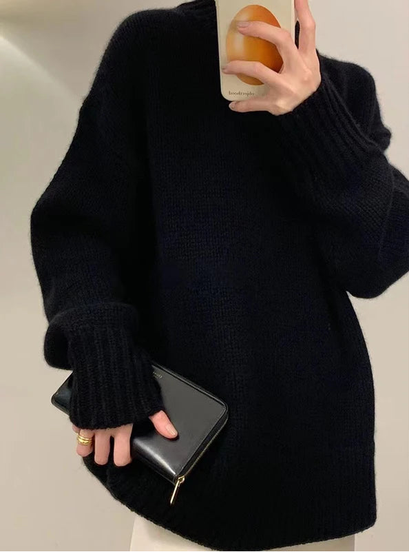 Close-up of heavyweight natural knit texture and ribbed collar on pure cashmere sweater.