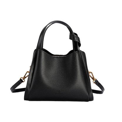 Black handbag with gold accents on a white background