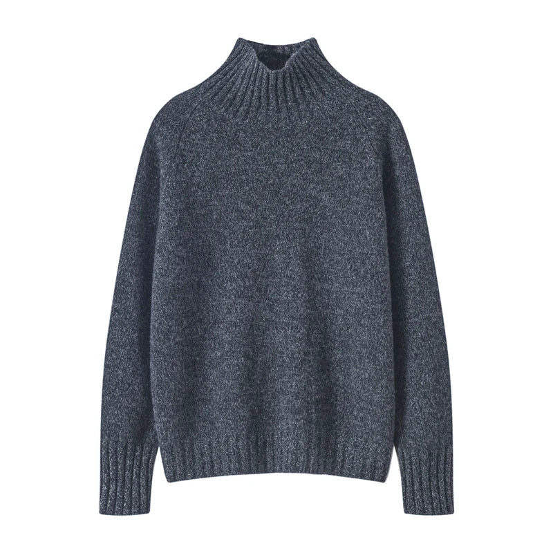Women's oversized wool turtleneck sweater in subtle earth-tone tie-dye knit.