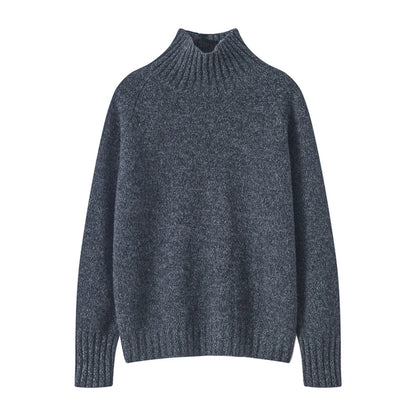 Women's oversized wool turtleneck sweater in subtle earth-tone tie-dye knit.