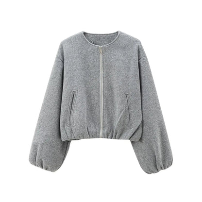 Gray sweater with balloon sleeves on a white background