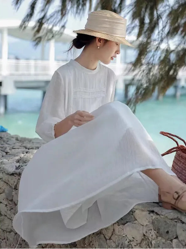 White A-line linen-blend maxi dress with horizontal pintuck chest pleating