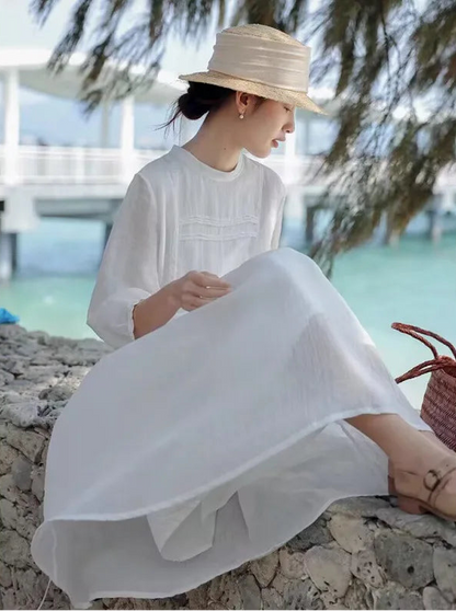 White A-line linen-blend maxi dress with horizontal pintuck chest pleating