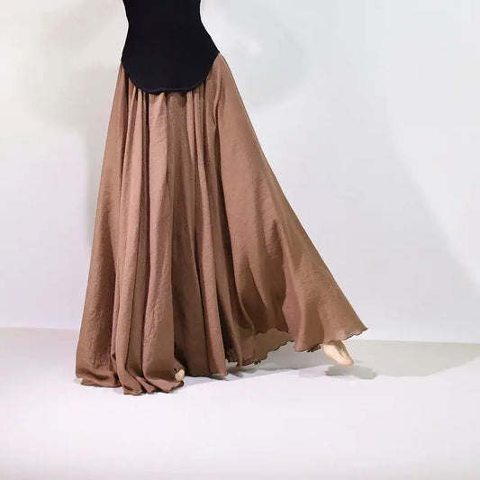 Brown long skirt being worn by a person on a white background
