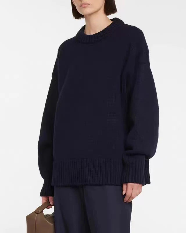 Close-up of heavyweight natural knit texture and ribbed collar on pure cashmere sweater.